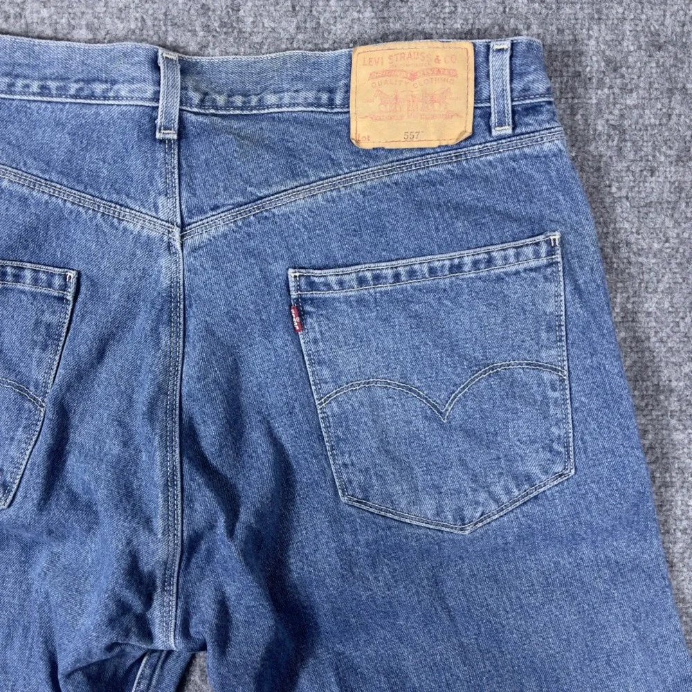 Levi's 557 Relaxed Bootcut Jeans Mens 35x34 Blue Denim 2001 Vintage 00s